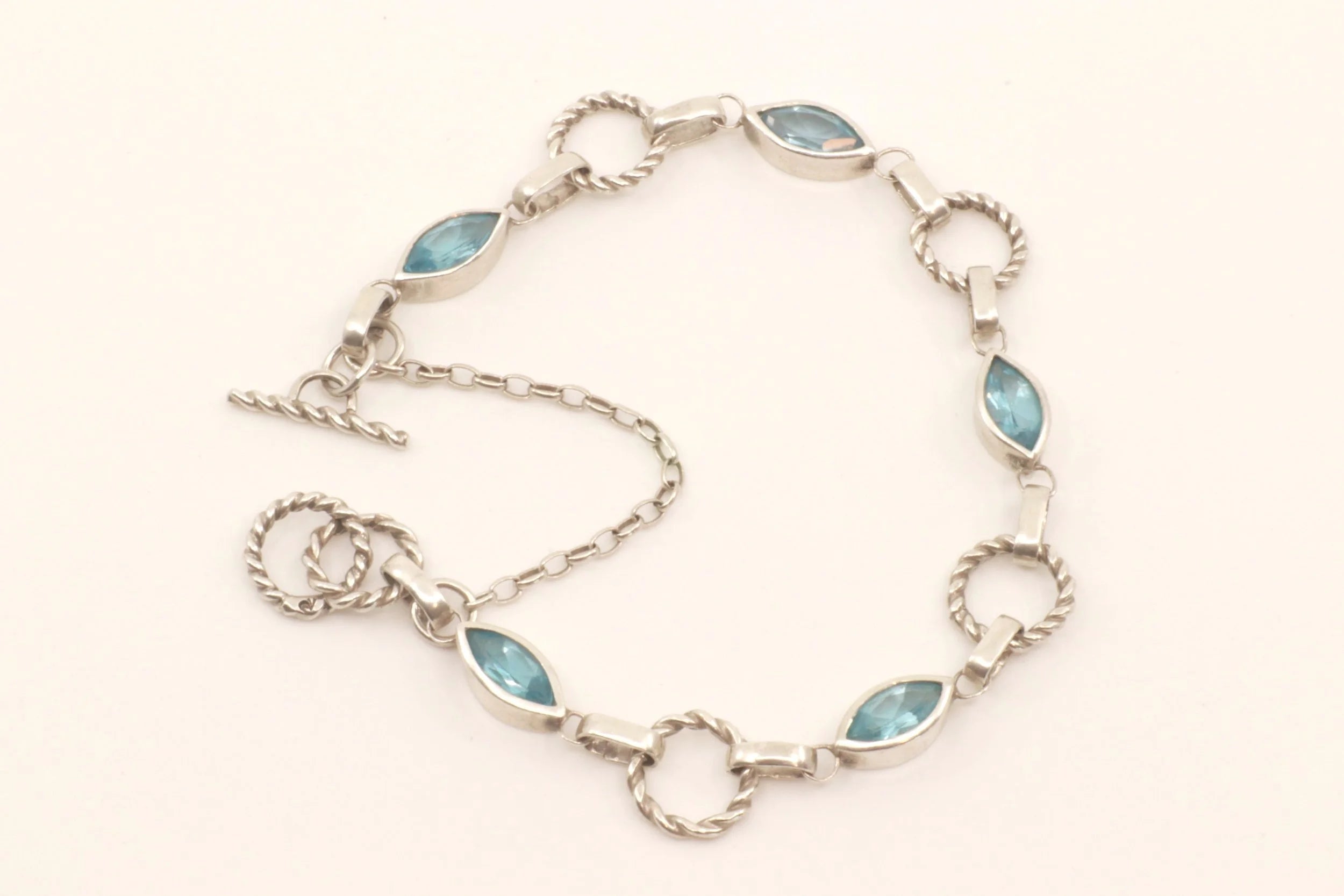 Eye of the Storm Bracelet - Sterling Silver and Swiss Blue Topaz