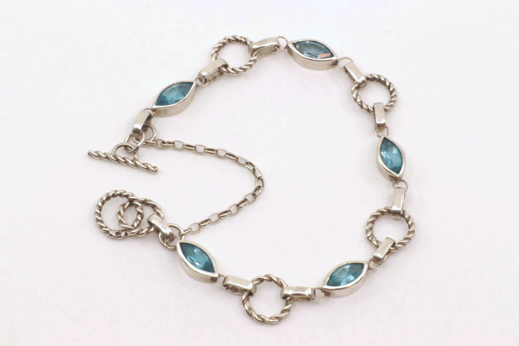 Eye of the Storm Bracelet - Sterling Silver and Swiss Blue Topaz