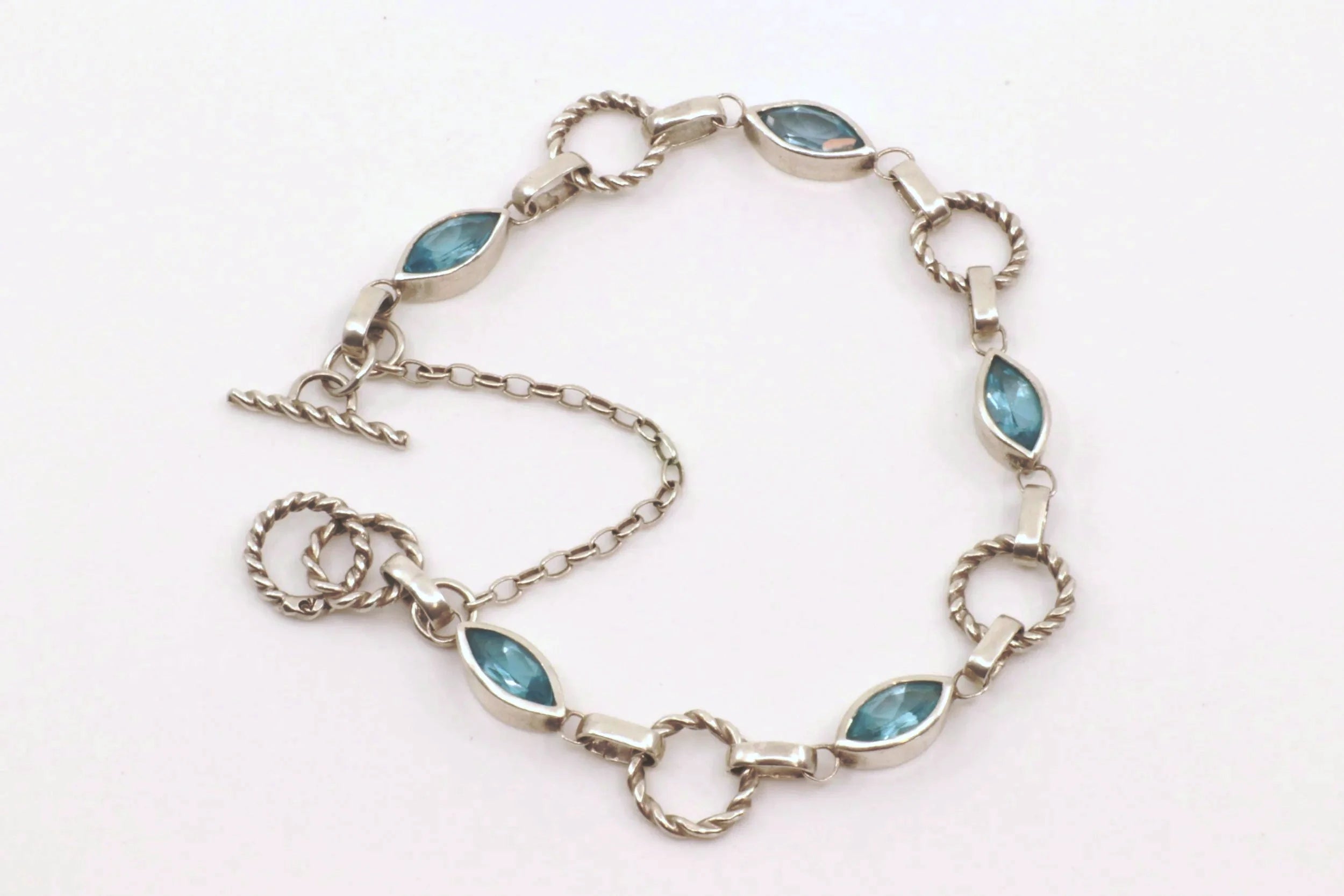 Eye of the Storm Bracelet - Sterling Silver and Swiss Blue Topaz