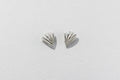 Pair of silver earrings on a light gray background
